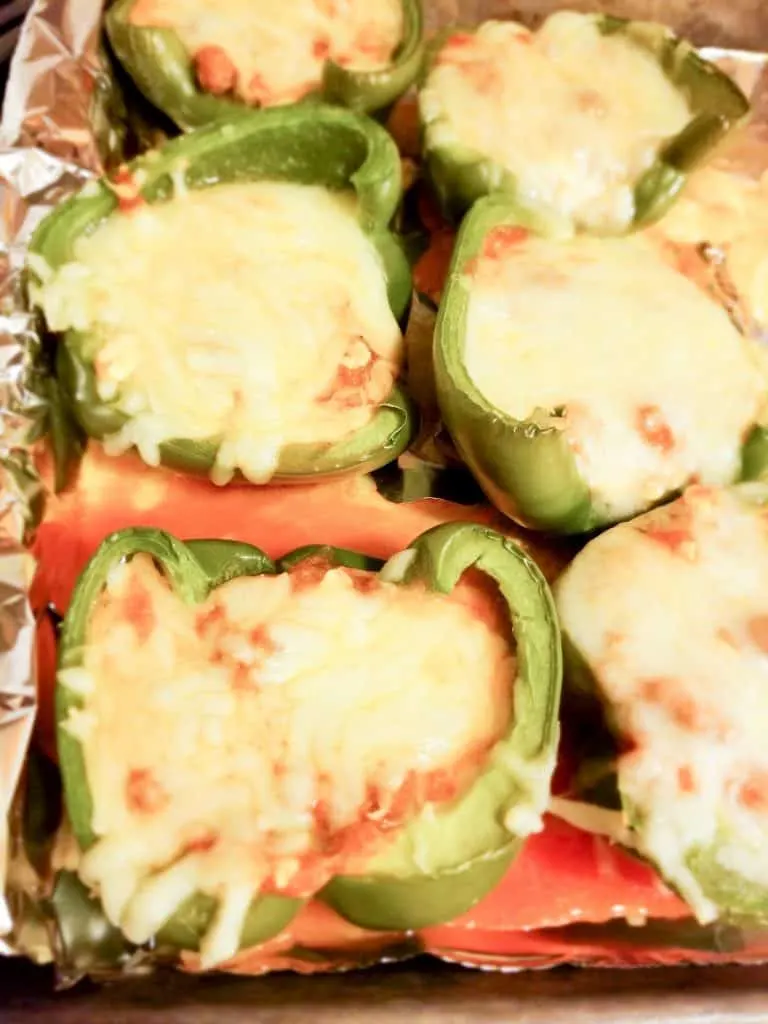 A close up of food, with low carb lasagna Stuffed peppers